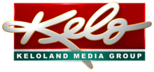 In a red box, a white thick script with the letters K E L O (the E L and O in lowercase), inside and extending beyond a red box. Beneath is a green box with the label "KELOLAND MEDIA GROUP".