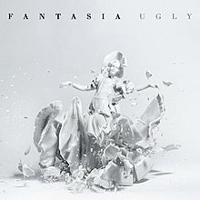 An image of a shattered white ceramic girl with the title of the single and the artist's name on the top.
