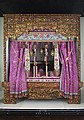 Peranakan Museum's central piece of display, the Peranakan Wedding Bed. Mrs. Quah gave birth to the first seven of her 11 children on this very bed