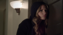 Actress Vanessa Ray as CeCe Drake eavesdropping on a conversation, using a black hoodie, blonde hair.