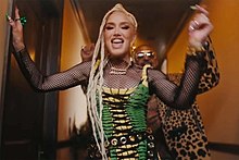 A color picture of singer Gwen Stefani, in the music video for the song "Light My Fire".